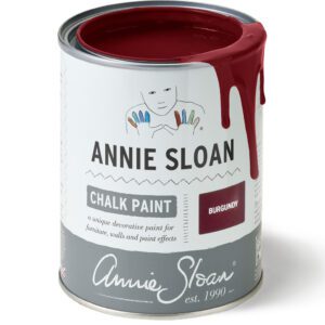 A can of Annie Sloan Chalk Paint in Burgundy color.
