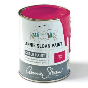 Can of Annie Sloan Chalk Paint with pink paint dripping over the top.
