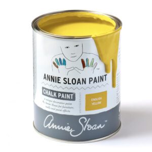 A can of Annie Sloan chalk paint in yellow.