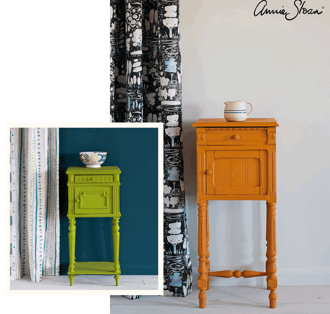 Two wooden bedside tables painted green and orange against blue and white walls.