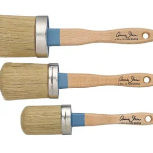 Three wooden-handled paintbrushes with natural bristles.